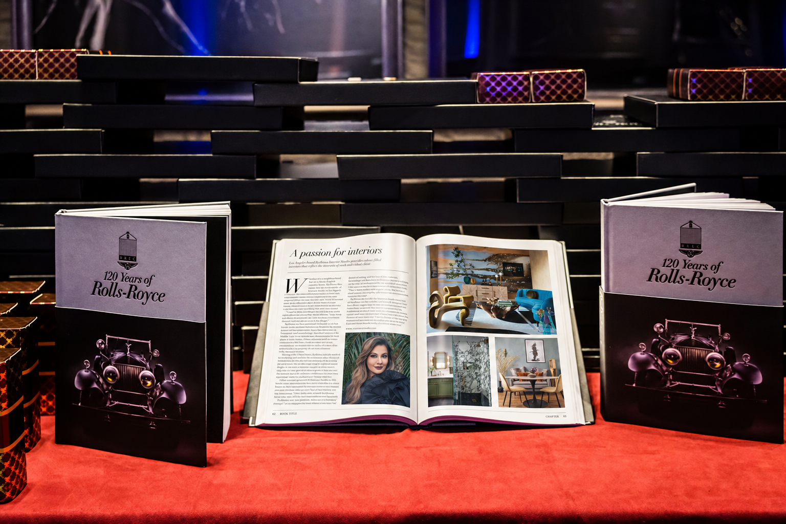 Book display with a digitally composited R/terior Studio spread in 120 Years of Rolls-Royce